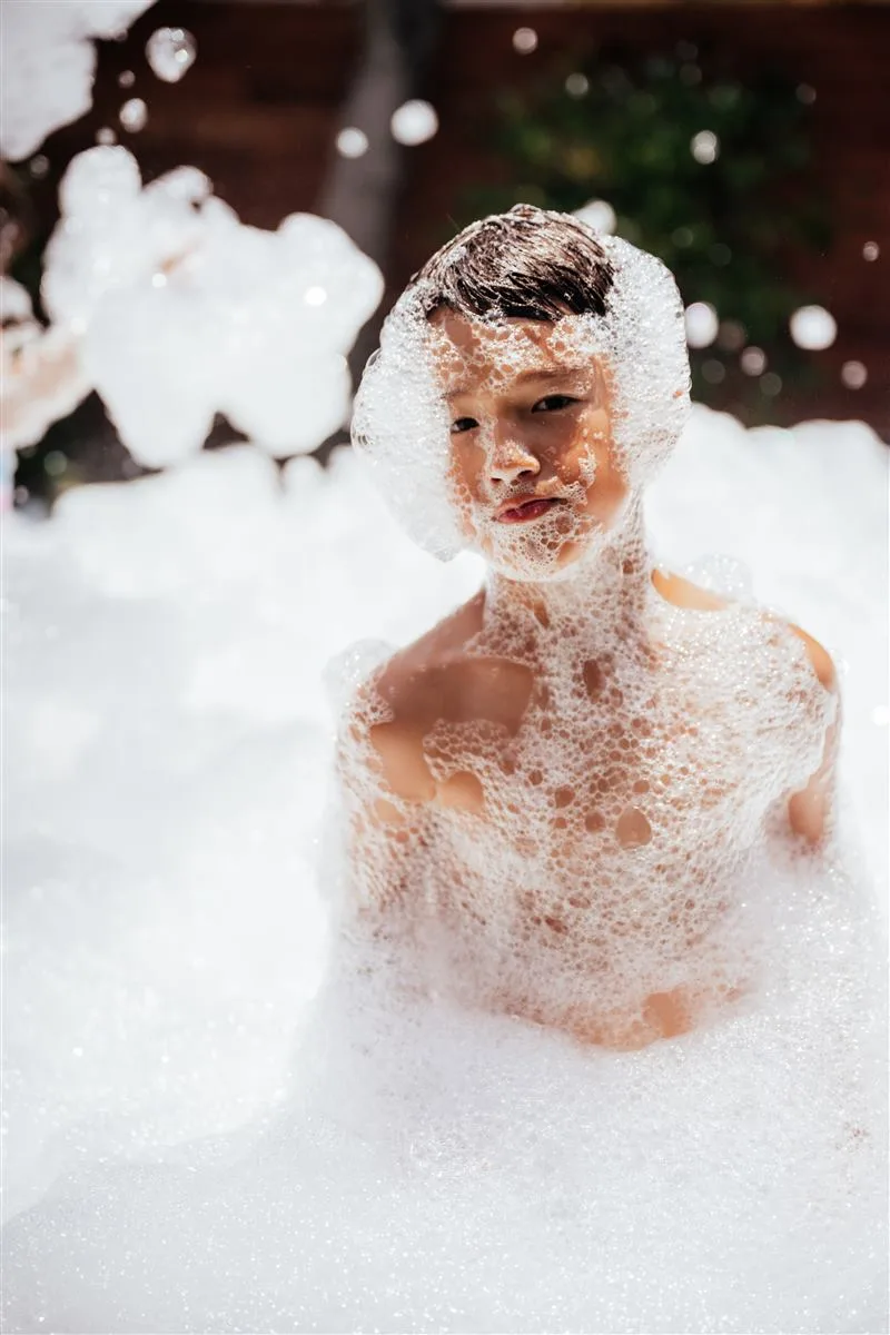 Kids playing in foam party