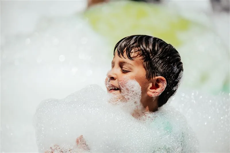 Kids covered head to toe in foam
