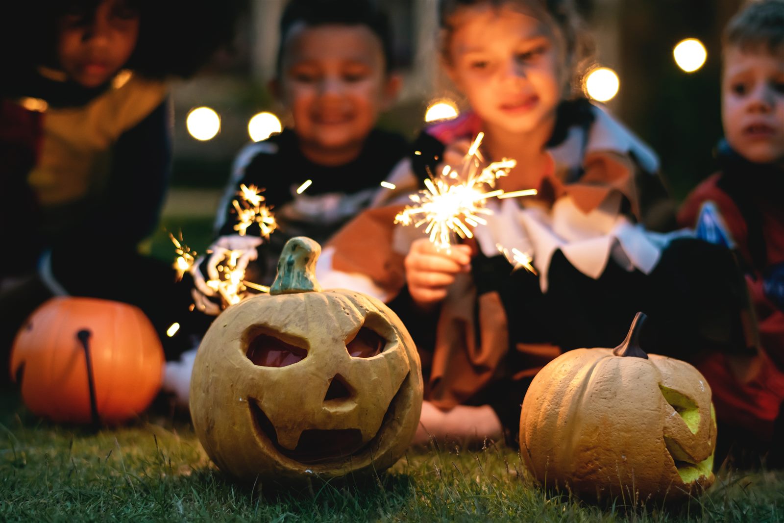 Kids in Halloween costumes at a spooky party